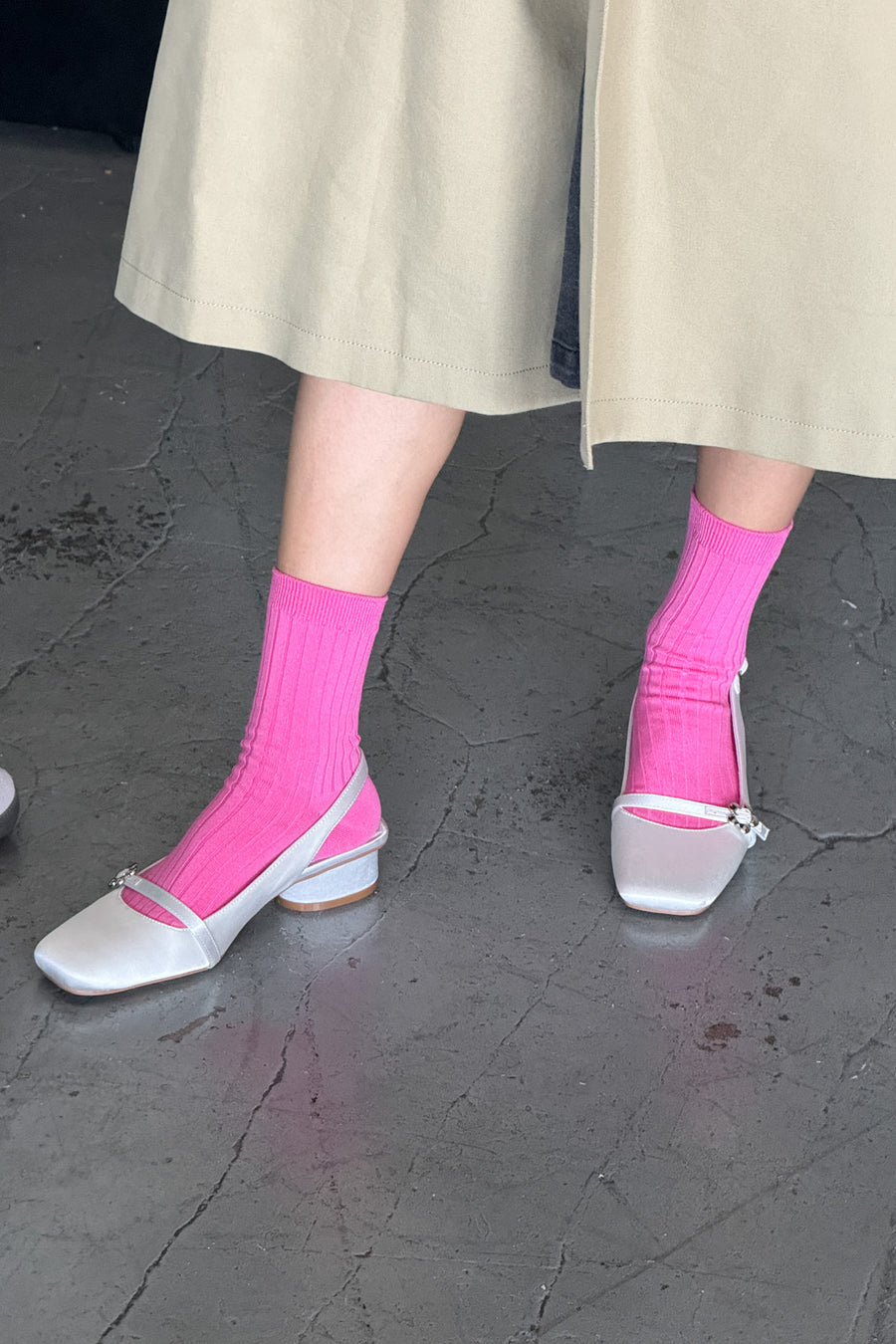 Her Socks in Bright Pink