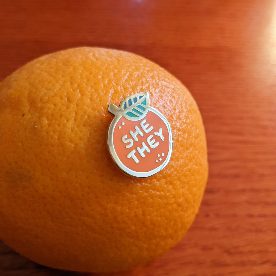 Pronoun Orange Pen - She/They